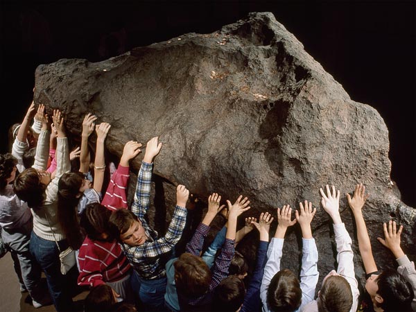 Young admirers pay tribute to Ahnighito, the second largest meteorite.