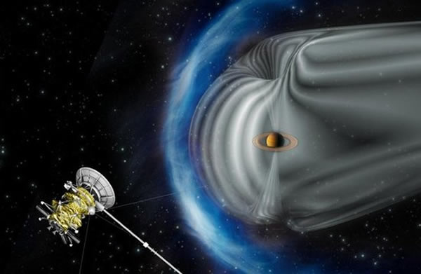 艺术家绘制的卡西尼探测器与土星周围巨大的“弓形激波”想象图