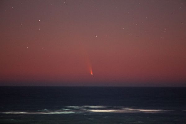 Comet Pan-STARRS soars above the Indian Ocean on March 6, 2013.