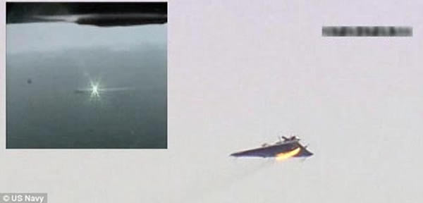 激光锁定住目标(左图),数秒后无人机着火并坠入海中。