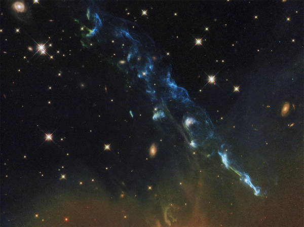 The intricate wisps of thin gas from Herbig-Haro 110 are captured in this stunni