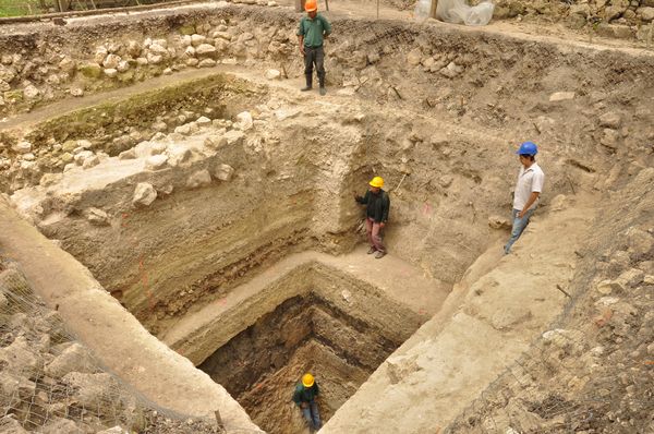 Archaeologists excavate through the A-24 platform to reach the foundations, date