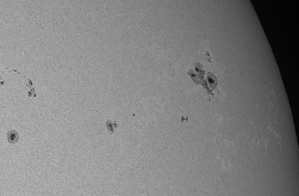 White light image of the solar transit of the Chinese Shenzhou-10 module docked