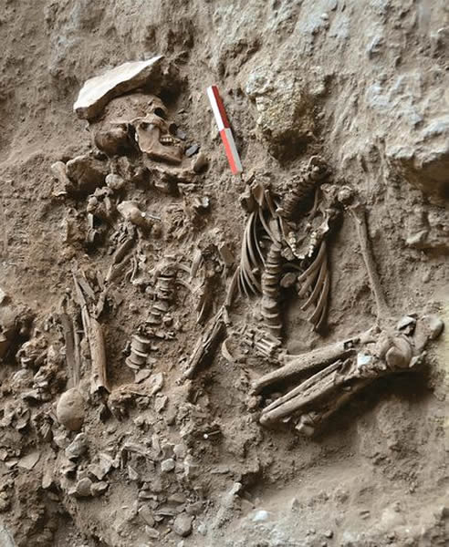 A double grave revealed the skeletons of an adult male and an adolescent who wer