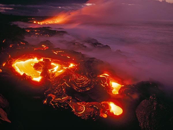 Lava from Kilauea volcano in Hawaii swirls before flowing into the ocean.