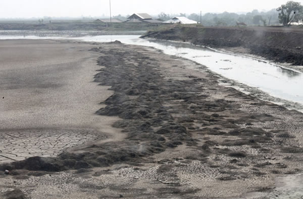 Site of Lusi mud eruption (image taken in 2011) showing part of the mud deposit