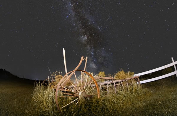 An early Perseid over a wagon at the Washburn-Norlands Historical Center in Live