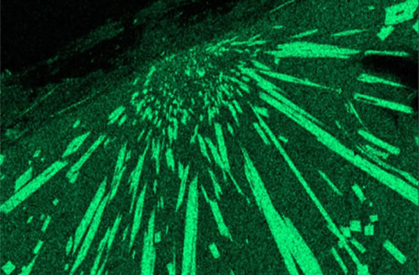 The high temperatures of the meteorite impact 12,900 years ago produced mm-sized