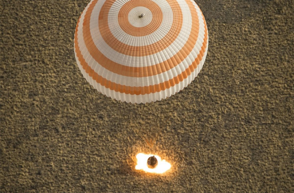 The Soyuz TMA-08M spacecraft with Expedition 36 Commander Pavel Vinogradov of th