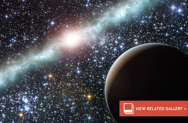 Giant Planet Seen Lurking Inside the Galactic Bulge