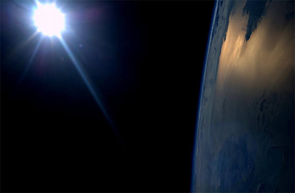 NASA astronaut Karen Nyberg took this photograph of the sun approaching sunset f