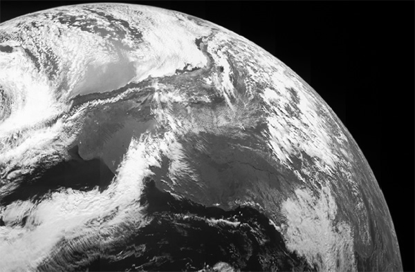 Smile, Earthlings: Jupiter Mission Captures Flyby Portrait