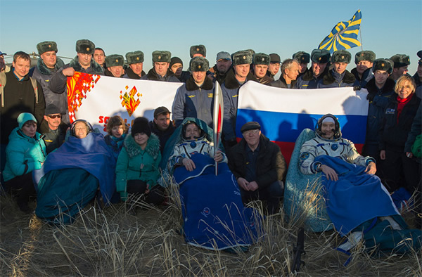 NASA Flight Engineer Karen Nyberg, left, Expedition 37 Commander Fyodor Yurchikh