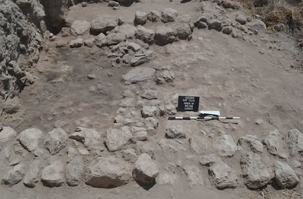 Burned ruins and fired mudbrick collapse, as well as smashed pottery, reveal the