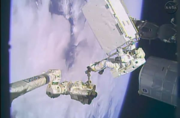 An astronaut works on the International Space Station on Christmas Eve, 2013.