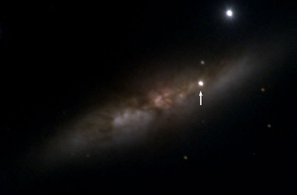 A color composite of SN 2014J, located in the cigar galaxy M82, 11.4 million l