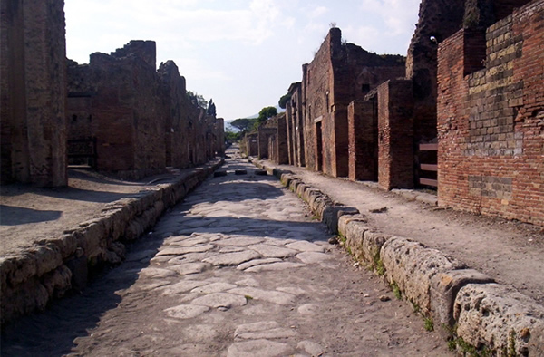 Pompeii Walls Crumble Under Rain and Red Tape