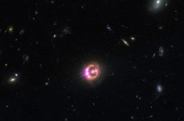 Multiple images of a distant quasar are visible in this combined view from NASA’