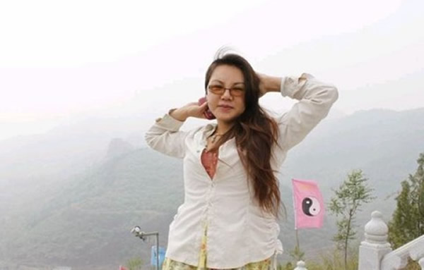 马航失联航班乘客中的河南女子翁美玲的父母早年皆死于空难