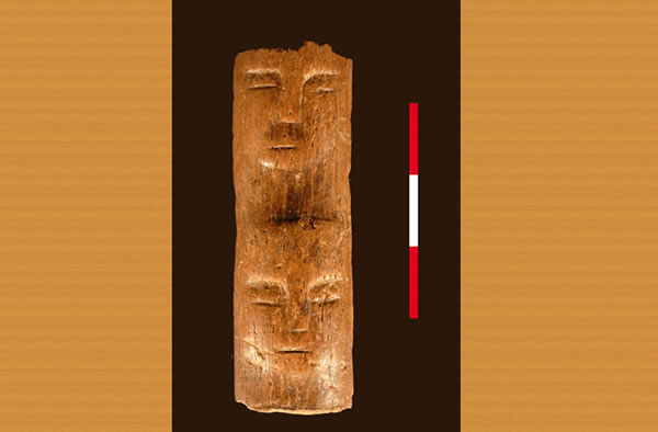 A 9,000-year-old wand with a face carved into it was discovered in Syria.