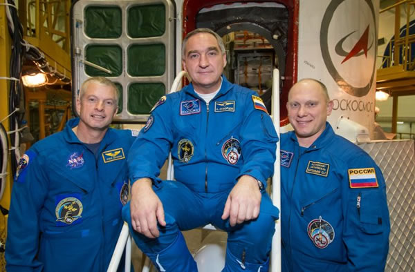 In the Integration Facility at the Baikonur Cosmodrome in Kazakhstan, NASA astro