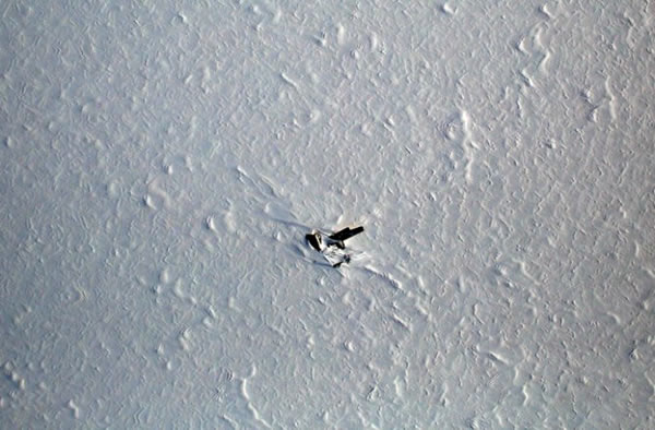 An old war plane, the Kee Bird, sits frozen in Greenland.