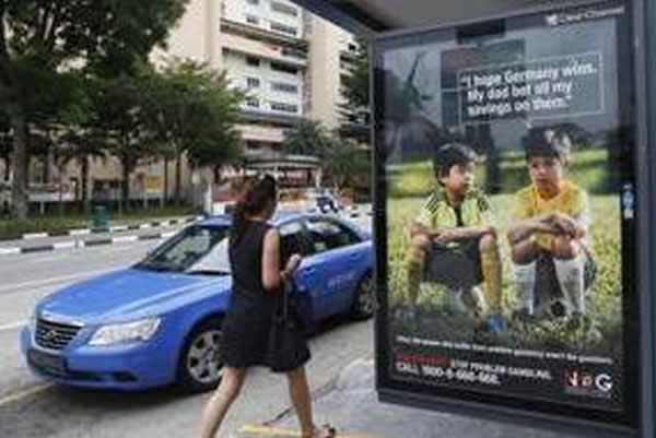 新加坡戒赌广告预言德国夺冠却弄巧成拙