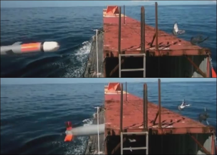 摄影机捕捉战斧击中货柜时,两只小白鸽及时飞走。