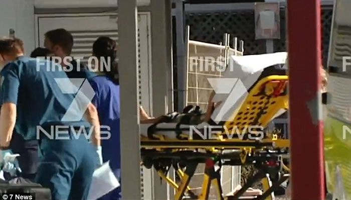 Boy, 11, is pulled from the water by his father and rushed to hospital after bei