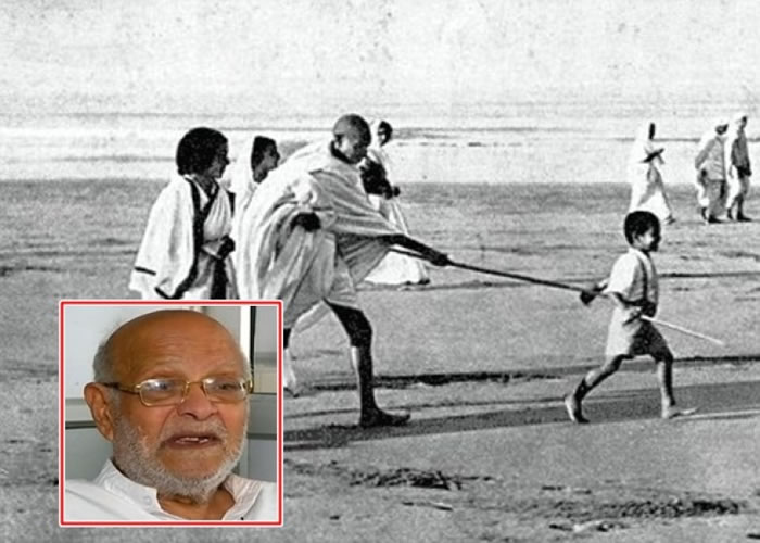 卡努布海(小图)因一张童年时随祖父甘地(中)参与不合作运动“食盐行军”的照片而闻名。