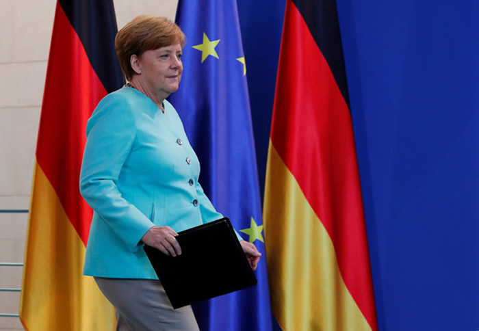 默克尔表示,履行《巴黎协定》是为了拯救地球母亲。