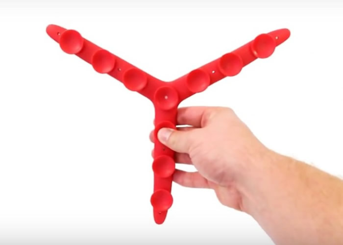 手机架由矽胶制成,外型有如一只只有三爪的章鱼。