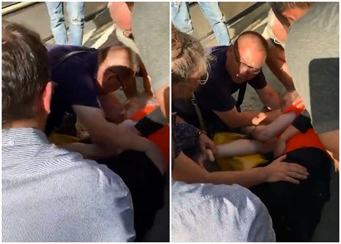 李文涛(穿黑衣者)发现病人后,随即为其施救。