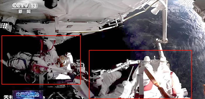 中国航天员刘伯明和汤洪波离开“天宫”号空间站的“天河”核心舱进入外太空